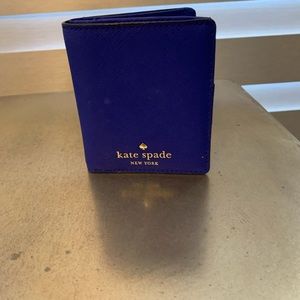 Kate Spade mini wallet in bright navy. Used for one trip.